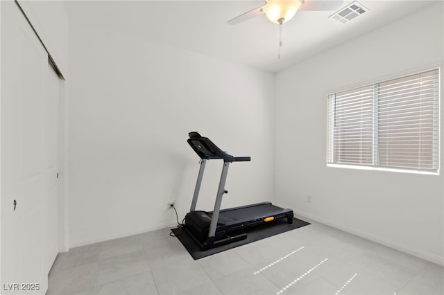 10951 Stone Crossing Ave, Las Vegas, NV 89166 - workout area with a ceiling fan, baseboards, and light tile patterned floors