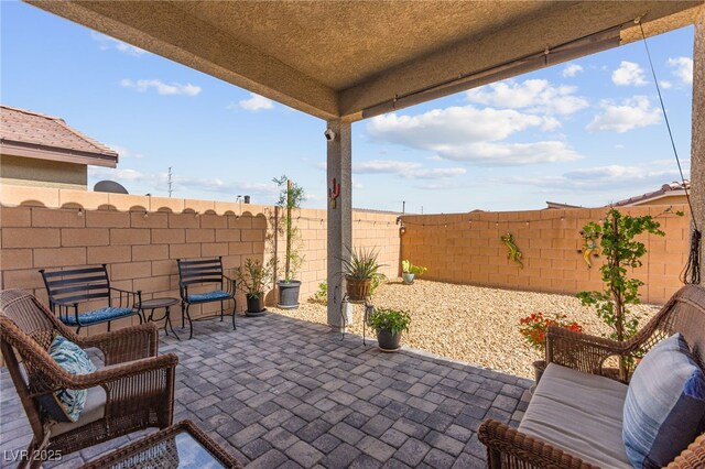 10951 Stone Crossing Ave, Las Vegas, NV 89166 - fenced backyard featuring a patio