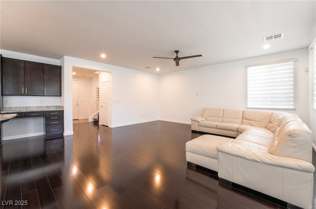 10315 Turia Gardens Rd, Las Vegas, NV 89135 - living room featuring ceiling fan, dark wood finished floors, recessed lighting, and baseboards