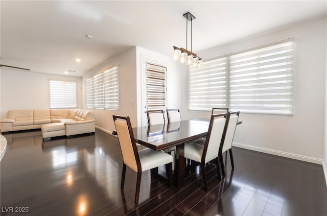 10315 Turia Gardens Rd, Las Vegas, NV 89135 - dining space with baseboards, dark wood-type flooring, and recessed lighting