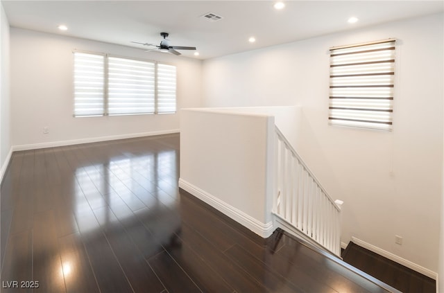 10315 Turia Gardens Rd, Las Vegas, NV 89135 - unfurnished room with baseboards, ceiling fan, recessed lighting, and dark wood-style floors