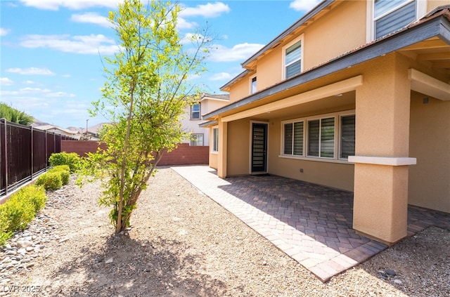 10315 Turia Gardens Rd, Las Vegas, NV 89135 - fenced backyard with a patio