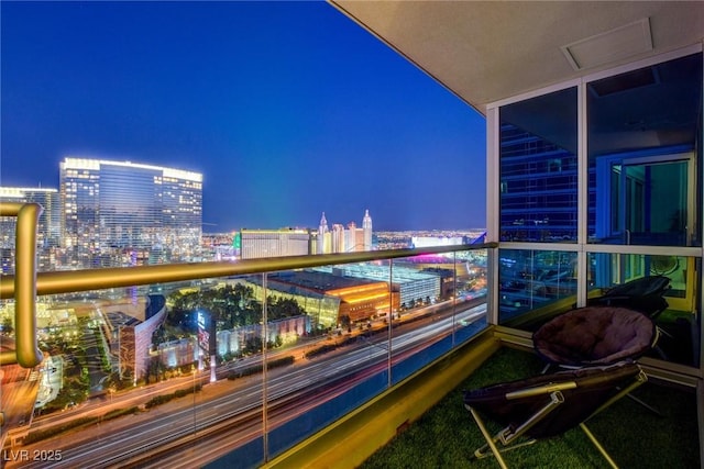 4525 Dean Martin Dr Unit 2901, Las Vegas, NV 89103 - balcony at twilight featuring a view of city lights
