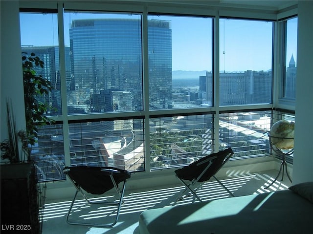 4525 Dean Martin Dr Unit 2901, Las Vegas, NV 89103 - sunroom featuring a city view and healthy amount of natural light