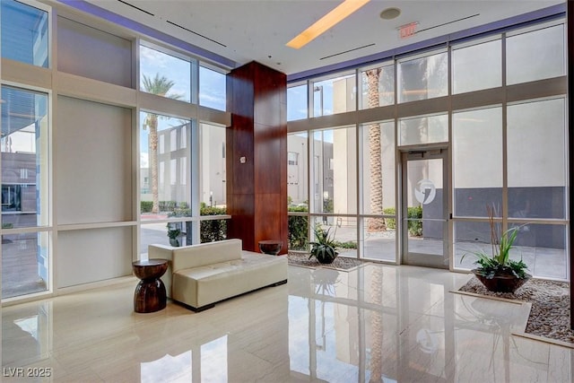 4525 Dean Martin Dr Unit 2901, Las Vegas, NV 89103 - lobby featuring a wall of windows and a towering ceiling