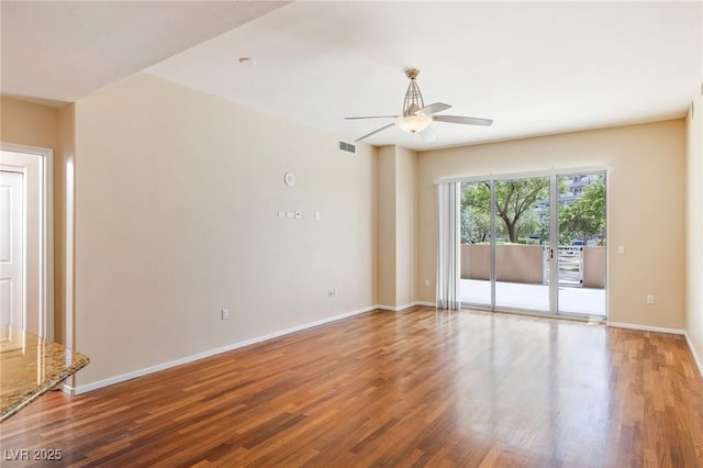 8255 Las Vegas Blvd Unit 117, Las Vegas, NV 89123 - empty room featuring ceiling fan, wood finished floors, and baseboards