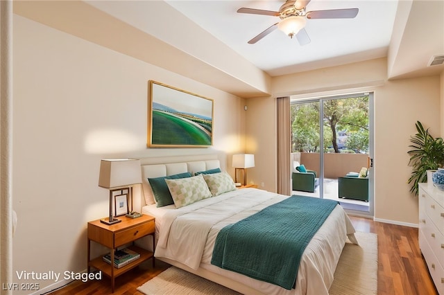 8255 Las Vegas Blvd Unit 117, Las Vegas, NV 89123 - bedroom with access to outside, wood finished floors, baseboards, and ceiling fan