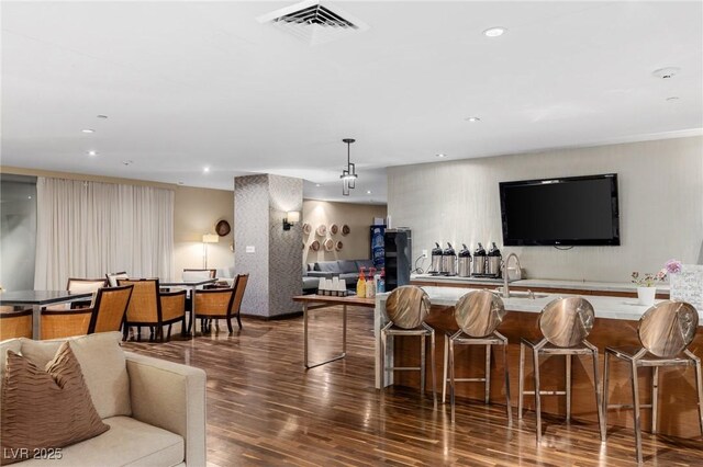8255 Las Vegas Blvd Unit 117, Las Vegas, NV 89123 - living area featuring dark wood-style floors and recessed lighting