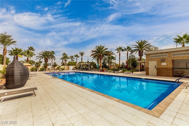 8255 Las Vegas Blvd Unit 117, Las Vegas, NV 89123 - community pool featuring a patio
