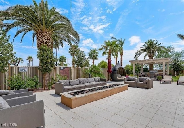 8255 Las Vegas Blvd Unit 117, Las Vegas, NV 89123 - fenced backyard with an outdoor living space with a fire pit, a patio, and a pergola