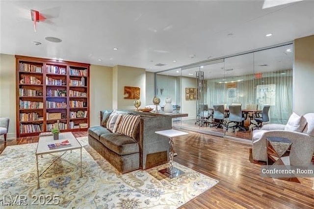 8255 Las Vegas Blvd Unit 117, Las Vegas, NV 89123 - living room with wood finished floors, recessed lighting, and built in shelves