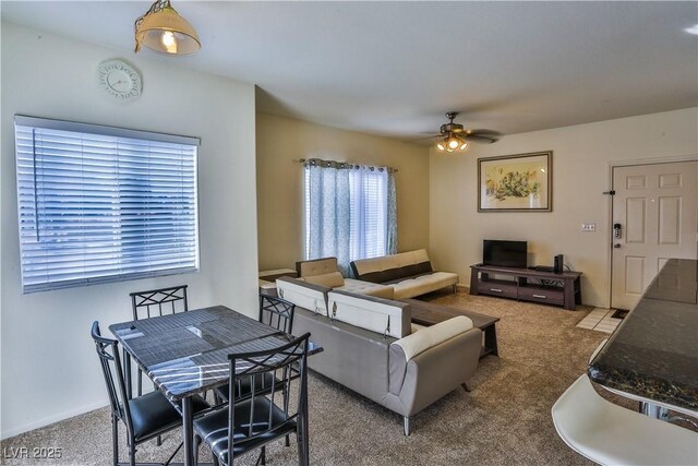 4655 Gold Dust Ave Unit 206, Las Vegas, NV 89120 - carpeted living area featuring a ceiling fan