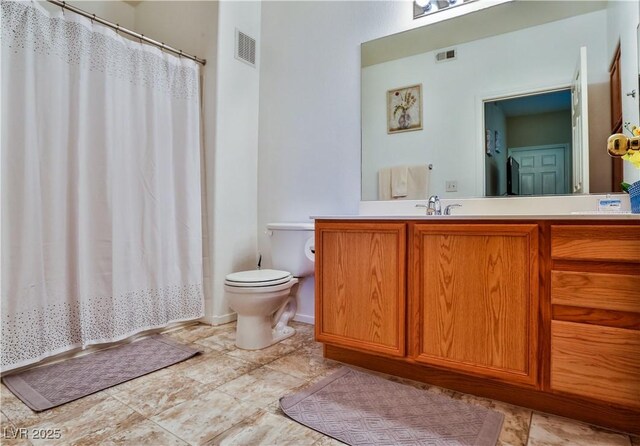 4655 Gold Dust Ave Unit 206, Las Vegas, NV 89120 - bathroom featuring vanity, toilet, and a shower with curtain