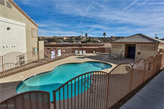 4655 Gold Dust Ave Unit 206, Las Vegas, NV 89120 - community pool featuring a patio and a gate