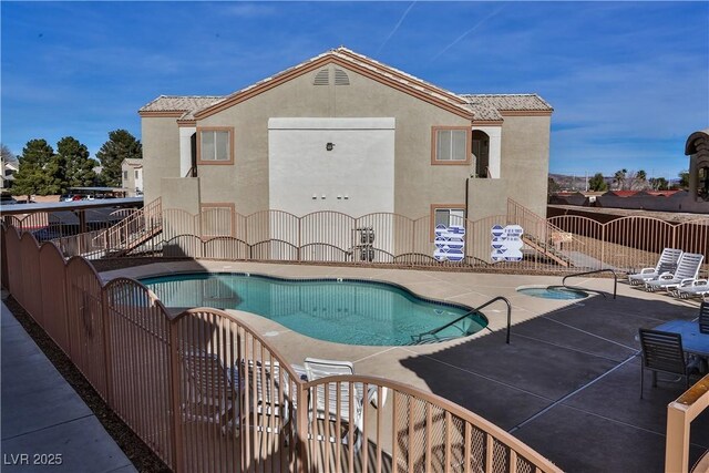 4655 Gold Dust Ave Unit 206, Las Vegas, NV 89120 - community pool with a patio area