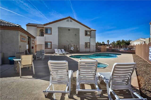 4655 Gold Dust Ave Unit 206, Las Vegas, NV 89120 - community pool featuring a fenced backyard and a patio area