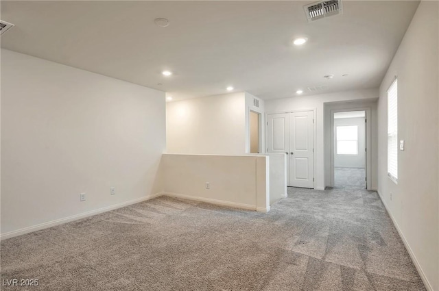 5398 Robinera Ct, Las Vegas, NV 89166 - unfurnished room featuring light colored carpet, recessed lighting, and baseboards