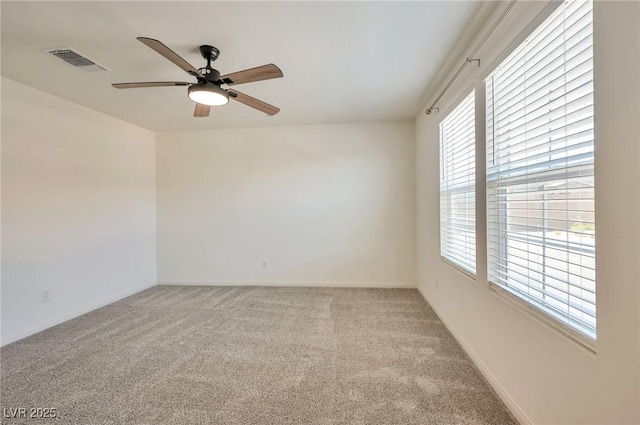 5398 Robinera Ct, Las Vegas, NV 89166 - unfurnished room featuring ceiling fan, light carpet, and baseboards