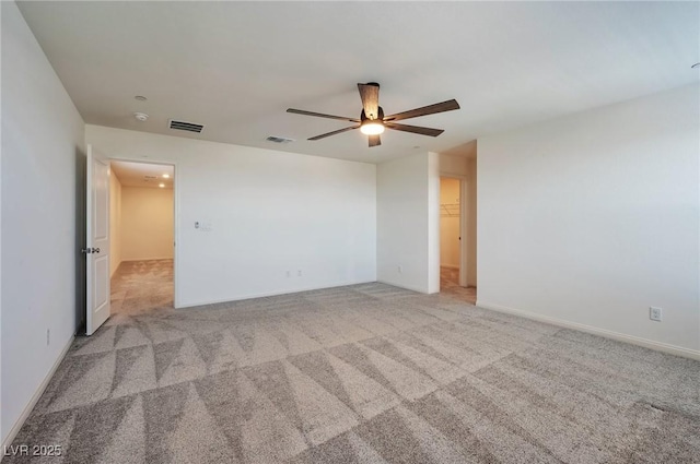 5398 Robinera Ct, Las Vegas, NV 89166 - unfurnished room with a ceiling fan and light colored carpet