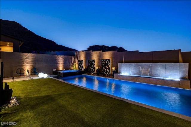 10228 Shell Star Ave, Las Vegas, NV 89135 - view of pool featuring a yard and a pool with connected hot tub