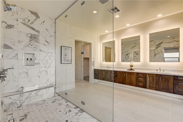 10228 Shell Star Ave, Las Vegas, NV 89135 - full bath with a stall shower, double vanity, tile patterned floors, and recessed lighting