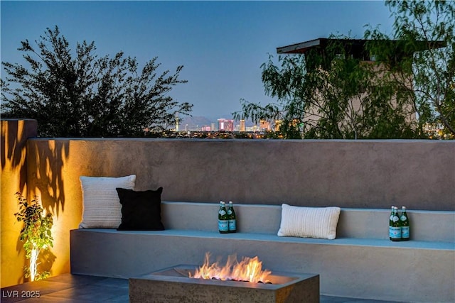 10228 Shell Star Ave, Las Vegas, NV 89135 - view of patio with an outdoor fire pit