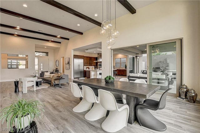 10228 Shell Star Ave, Las Vegas, NV 89135 - dining room with beamed ceiling, light wood-style floors, and recessed lighting