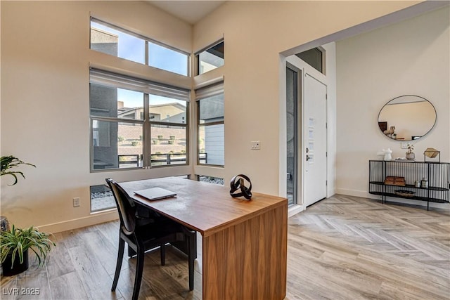 10228 Shell Star Ave, Las Vegas, NV 89135 - office area with baseboards and light wood finished floors