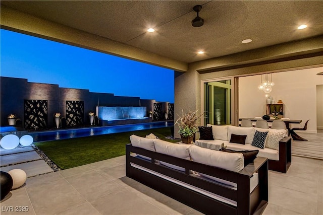10228 Shell Star Ave, Las Vegas, NV 89135 - view of patio / terrace with an outdoor hangout area and a pool