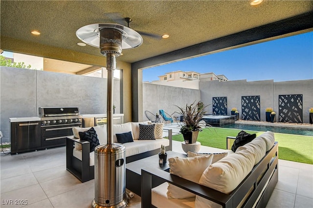 10228 Shell Star Ave, Las Vegas, NV 89135 - fenced backyard with an outdoor hangout area, a patio, and ceiling fan