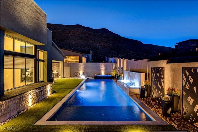 10228 Shell Star Ave, Las Vegas, NV 89135 - view of pool with a mountain view and a hot tub