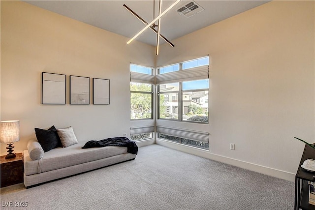 10228 Shell Star Ave, Las Vegas, NV 89135 - sitting room with carpet, a chandelier, and baseboards