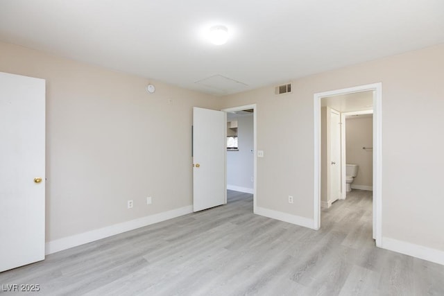 555 E Silverado Ranch Blvd Unit 2164, Las Vegas, NV 89183 - unfurnished bedroom featuring light wood-style floors and baseboards