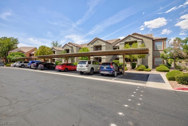 555 E Silverado Ranch Blvd Unit 2164, Las Vegas, NV 89183 - view of front of property featuring covered parking and a residential view