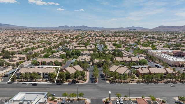555 E Silverado Ranch Blvd Unit 2164, Las Vegas, NV 89183 - aerial view of residential area with a mountainous background and property boundaries highlighted
