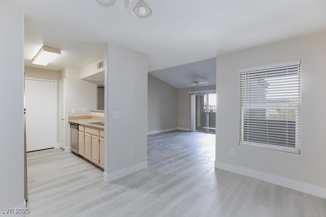 555 E Silverado Ranch Blvd Unit 2164, Las Vegas, NV 89183 - kitchen with stainless steel dishwasher, light wood-style flooring, baseboards, light countertops, and ceiling fan