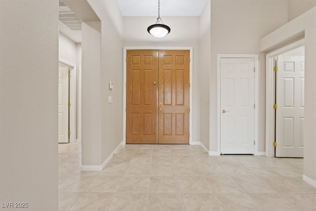 1008 New Creek Ave, Henderson, NV 89015 - foyer entrance with light tile patterned floors and baseboards
