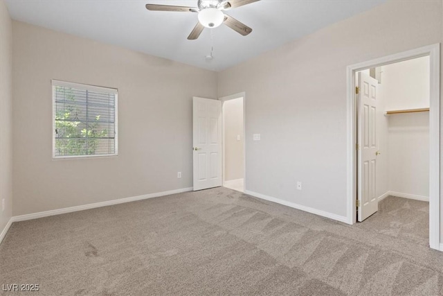 1008 New Creek Ave, Henderson, NV 89015 - unfurnished bedroom with carpet flooring, a spacious closet, baseboards, and ceiling fan