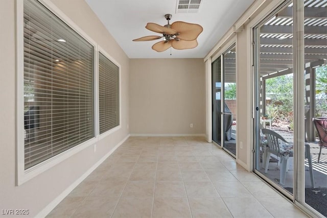 1008 New Creek Ave, Henderson, NV 89015 - spare room featuring a ceiling fan, light tile patterned floors, and baseboards