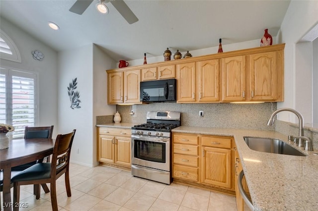 6 Sandwedge Dr, Henderson, NV 89074 - kitchen with appliances with stainless steel finishes, a sink, vaulted ceiling, backsplash, and ceiling fan