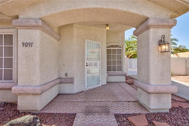 9091 W Viking Rd, Las Vegas, NV 89147 - property entrance with stucco siding
