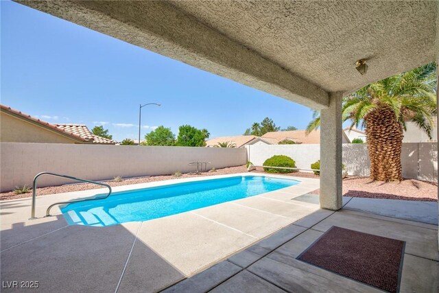 9091 W Viking Rd, Las Vegas, NV 89147 - view of pool with a fenced backyard and a patio