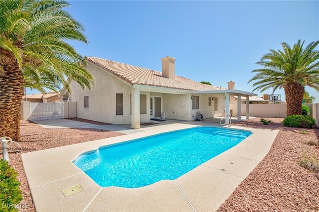 9091 W Viking Rd, Las Vegas, NV 89147 - view of pool featuring a patio area and a fenced backyard