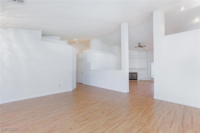 9091 W Viking Rd, Las Vegas, NV 89147 - unfurnished room with vaulted ceiling, light wood finished floors, a ceiling fan, baseboards, and recessed lighting