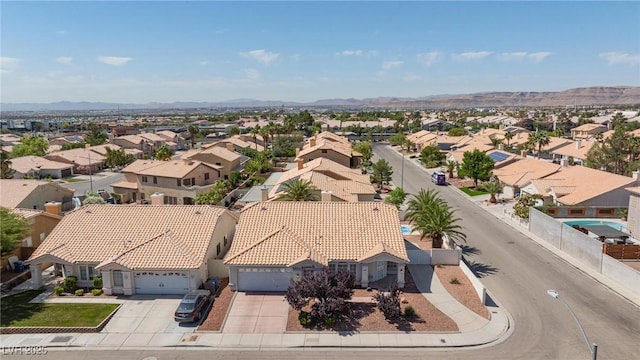 9091 W Viking Rd, Las Vegas, NV 89147 - aerial perspective of suburban area with mountains