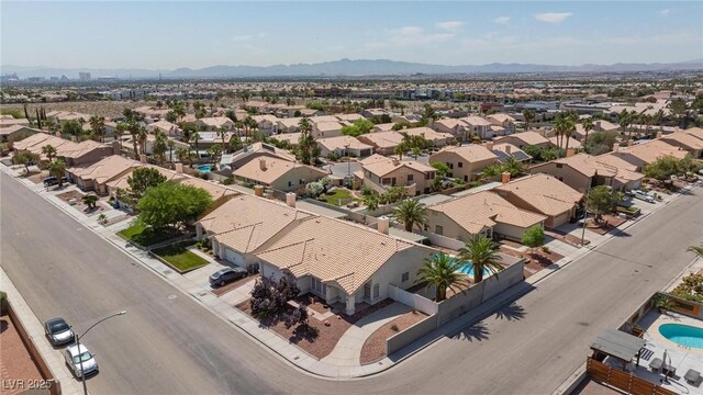 9091 W Viking Rd, Las Vegas, NV 89147 - aerial perspective of suburban area featuring a mountainous background