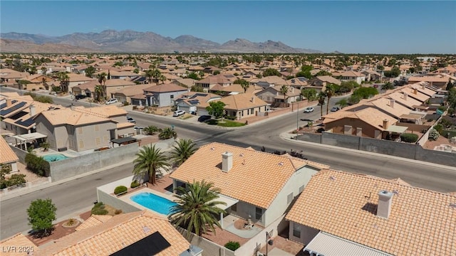 9091 W Viking Rd, Las Vegas, NV 89147 - aerial perspective of suburban area featuring mountains and a pool
