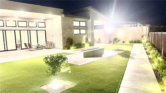 5166 Stone View Dr, Las Vegas, NV 89135 - back of property with a patio area and stucco siding