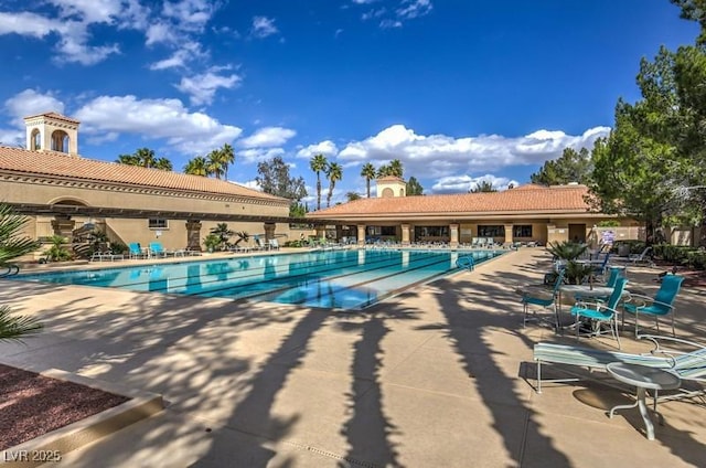 10421 Linfield Pl, Las Vegas, NV 89134 - community pool featuring a patio area