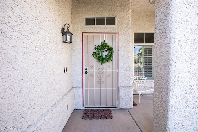 8437 Cinnamon Hill Ave, Las Vegas, NV 89129 - entrance to property with stucco siding